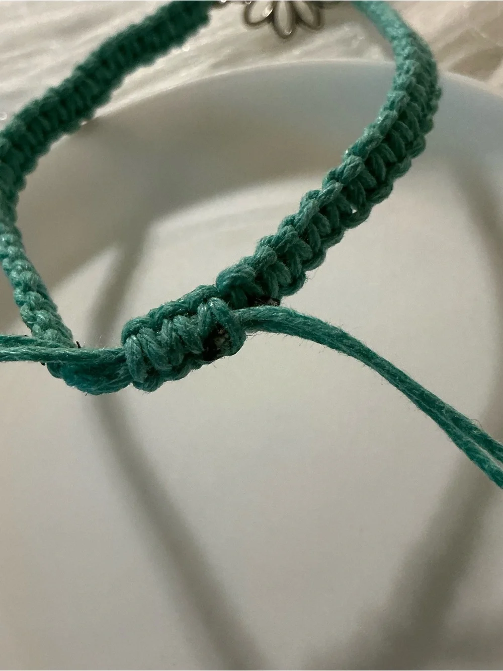 Pretty blue floral charm string bracelet